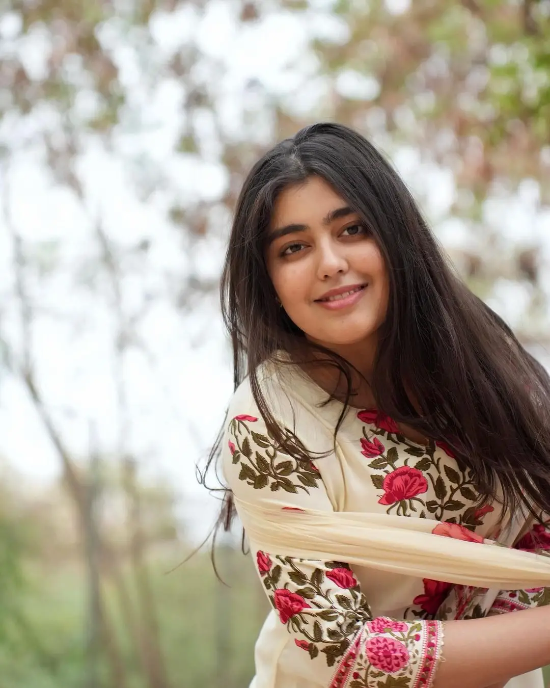 Gargeyi Yellapragada Smiling Face Long Hair White Dress